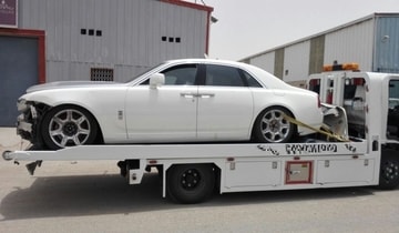 a flatbed service tow truck for sport and sport cars with lamborghini on top in al khobar